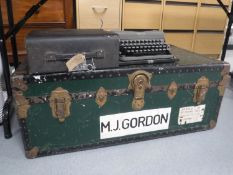 A cased Imperial typewriter and a metal bound shipping trunk