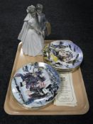 A Nao figure - bride and groom and a set of eight RAF collector's plates with certificates