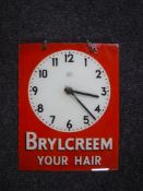 A mid 20th century glass advertising clock - Brylcreem your hair