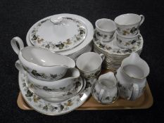 One hundred and forty eight pieces of Royal Doulton Larchmont tea and dinner ware