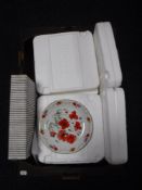 Two boxes of twenty five collector's plates including eight Danbury Mint Enchanted Garden,