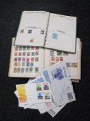 Two mid 20th century stamp albums and stamps and an envelope of stamps