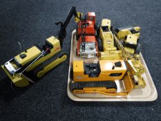 A tray of five Tonka toys including Bulldozer T6, lorry with crane, steam roller, loader,