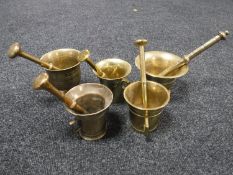 Five brass pestle and mortars