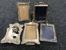 Five sterling silver photo frames CONDITION REPORT: These are all English,