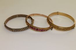 Three antique gold bangles
