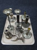A tray of assorted brass ware including candlesticks, ships,