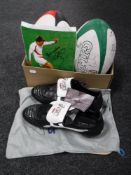 A collection of signed rugby memorabilia including a pair of Asic rugby boots size 8,