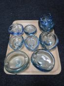 A tray of seven glass Holmegaard ash trays signed to the base and three other similar