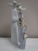 Two Lladro figures - nuns and girl with hat