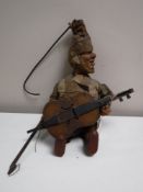 An antique Austrian puppet - man playing violin