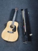 A Martin Smith acoustic guitar and a cased Pro Snooker cue