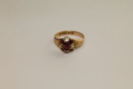 A 15ct gold ruby and citrine ring,