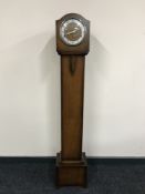 An oak granddaughter clock