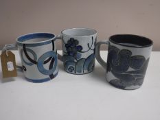 Three Royal Copenhagen mugs, height 11.