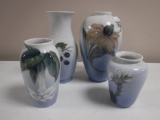 Four Royal Copenhagen vases depicting fruits and flowers