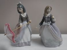 Two Lladro figures of ladies (one missing parasol)