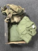 A box of ten military olive shirts together with a small quantity of webbing and two boxes of