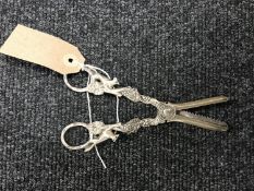A set of sterling silver grape scissors