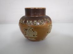 A Royal Doulton stoneware Colman's Mustard pot, height 5.