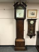 A George III oak eight day longcase clock with painted dial signed James Thompson,