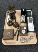 A tray containing a silver cased fob and pocket watch, assorted wristwatches, two Singer oil cans,