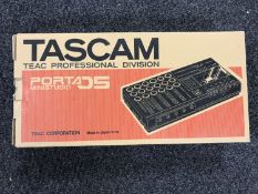 A boxed Tascam Porta 05 mini studio