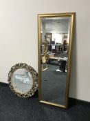 A gilt framed hall mirror and a circular gilt chalk framed mirror