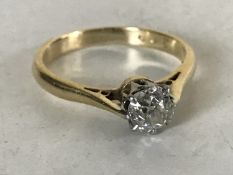 An old cut diamond solitaire ring,