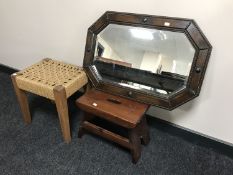 An oak rush seated stool, Edwardian oak framed mirror,