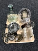 A tray of assorted glass ware, pair of marble horse head bookends, brass bell,