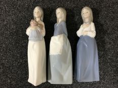 Three Nao figures of girls