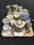 A tray of commemorative tea cups and mugs, Goss pieces, Mid Winter teapot,