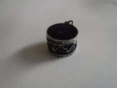 An enamelled white metal pill box, possibly Russian, in the form of a drum.