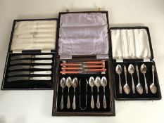Three boxed sets of plated flatware