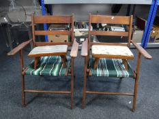 A pair of mid 20th century folding garden armchairs together with two stools