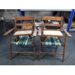A pair of mid 20th century folding garden armchairs together with two stools