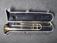 A Rosehill brass trombone in case