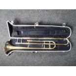 A Rosehill brass trombone in case