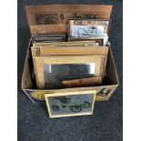 A box containing etched metal pictures