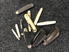 A collection of pen and pocket knives