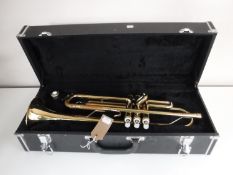 A Jupiter brass trumpet in case