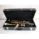 A Jupiter brass trumpet in case