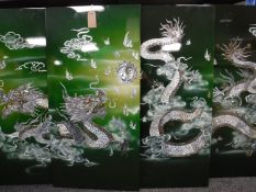 A set of four Chinese wall panels
