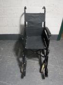 A folding wheel chair