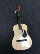 A Burswood acoustic guitar