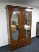 A Victorian mahogany double door wardrobe and marble topped wash stand