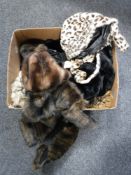 A box of fur hats,