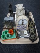 A tray of horse brasses, mid 20th century Smiths interval timer, pottery Tang horse,