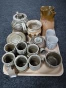 A tray of fourteen piece pottery tea service, pottery sake cups,